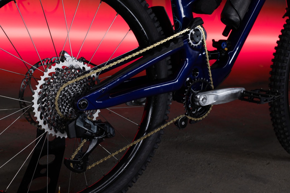 Crankset, chainring, cassette and rear derailleur on a modern full-suspension mountain bike.